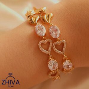دستبند قلب ژیوا از جنس YSX با طراحی قلب، رنگ طلایی و نگین‌های درخشان، مناسب استفاده روزانه و هدیه